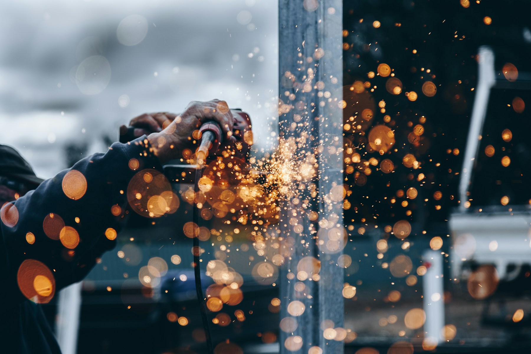 Construction worker inspecting steelwork on site